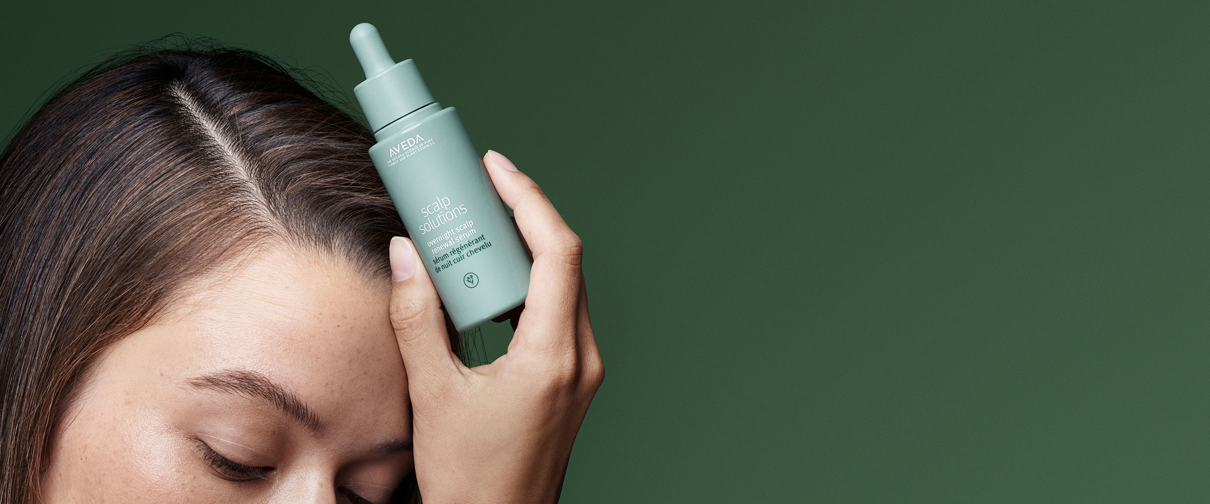 Shop Aveda's scalp solutions overnight scalp renewal serum improving scalp hydration by 51% in one night.